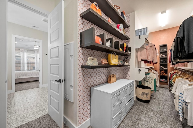 1840 Big Spring Dr, Forney, TX 75126 - spacious closet with carpet floors and a ceiling fan
