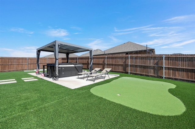 view of yard featuring a gazebo, a patio area, and a fenced backyard