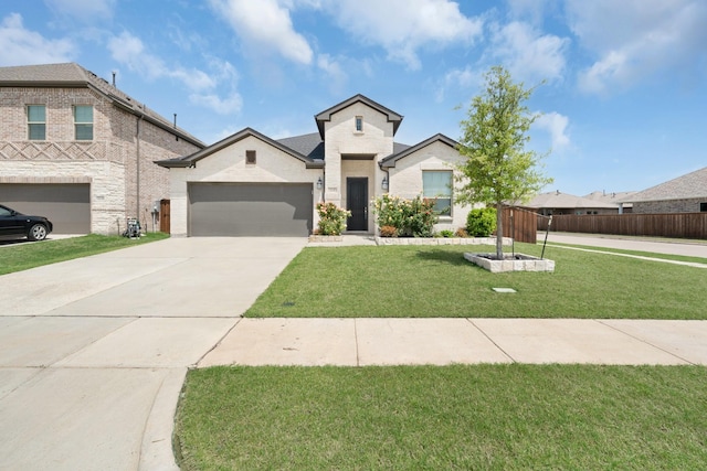 view of front facade with brick siding, a front lawn, driveway, and a garage
