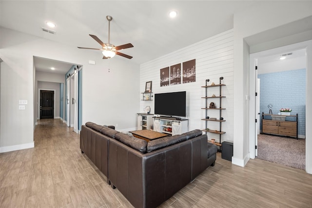 1840 Big Spring Dr, Forney, TX 75126 - living area with ceiling fan and light wood-style floors