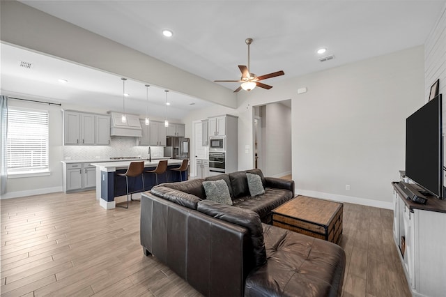 1840 Big Spring Dr, Forney, TX 75126 - living room featuring ceiling fan, light wood finished floors, and recessed lighting