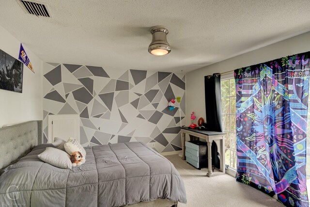221 Summit Dr, Bossier City, LA 71111 - bedroom with carpet flooring, a textured ceiling, an accent wall, and wallpapered walls