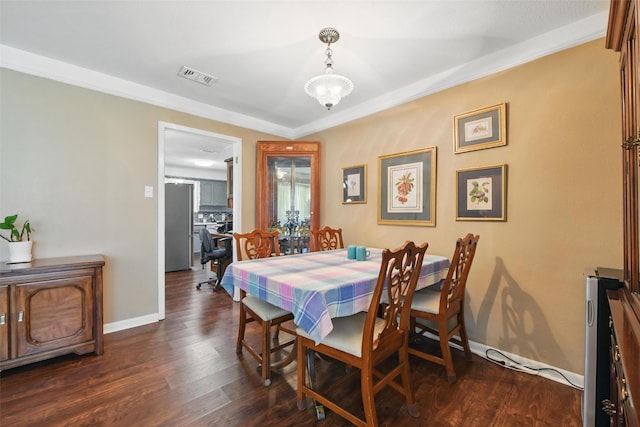 3433 Lawndale Ave, Fort Worth, TX 76133 - dining area with visible vents, dark wood-type flooring, and baseboards