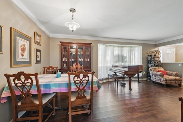 3433 Lawndale Ave, Fort Worth, TX 76133 - dining area featuring baseboards, dark wood-style floors, and ornamental molding