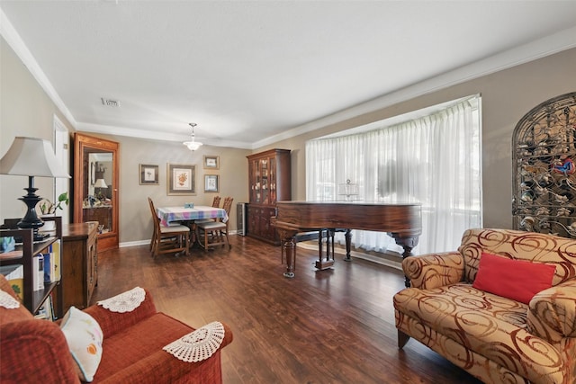 3433 Lawndale Ave, Fort Worth, TX 76133 - living room featuring visible vents, ornamental molding, baseboards, and wood finished floors