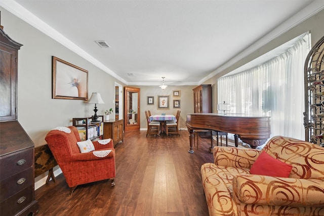 3433 Lawndale Ave, Fort Worth, TX 76133 - living room with visible vents, crown molding, baseboards, and dark wood-style flooring
