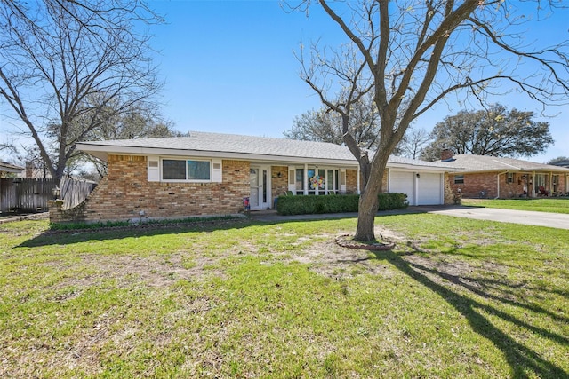 3433 Lawndale Ave, Fort Worth, TX 76133 - single story home with fence, driveway, a front lawn, a garage, and brick siding