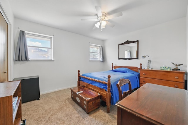 3433 Lawndale Ave, Fort Worth, TX 76133 - bedroom with ceiling fan, baseboards, a closet, and light carpet
