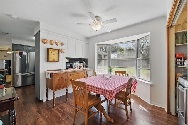 3433 Lawndale Ave, Fort Worth, TX 76133 - dining space with dark wood finished floors, baseboards, visible vents, and ceiling fan
