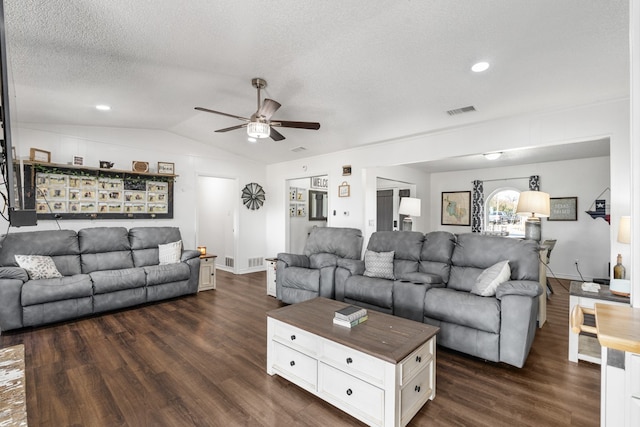 18341 Shore Dr, Kemp, TX 75143 - living area featuring visible vents, lofted ceiling, ceiling fan, dark wood-style floors, and a textured ceiling