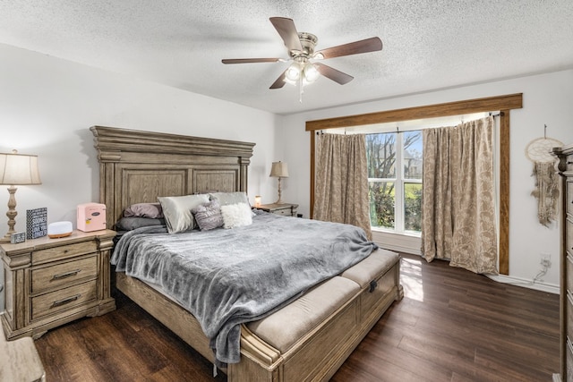 18341 Shore Dr, Kemp, TX 75143 - bedroom with a ceiling fan, dark wood-style floors, and a textured ceiling