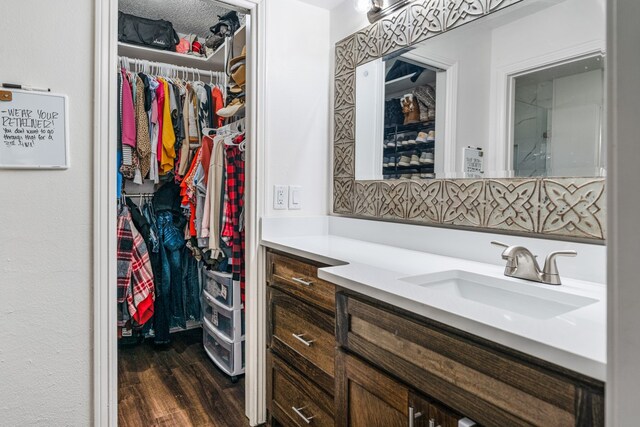 18341 Shore Dr, Kemp, TX 75143 - interior space featuring a sink and dark wood-style flooring
