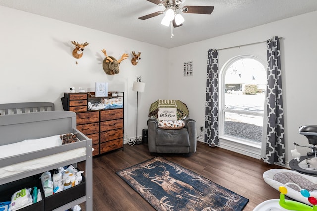 18341 Shore Dr, Kemp, TX 75143 - bedroom featuring a textured ceiling, ceiling fan, and wood finished floors