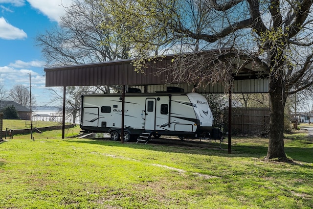 18341 Shore Dr, Kemp, TX 75143 - view of car parking with fence and a carport