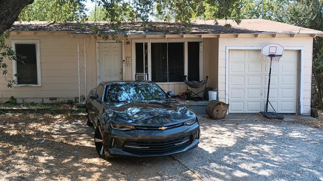 exterior space with crawl space and an attached garage