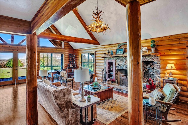 living room with a fireplace, high vaulted ceiling, hardwood / wood-style floors, beamed ceiling, and log walls