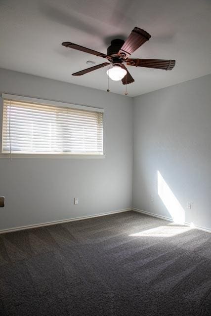 4424 Denver Dr, Plano, TX 75093 - carpeted spare room featuring baseboards and a ceiling fan