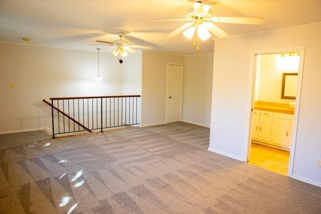 4424 Denver Dr, Plano, TX 75093 - carpeted empty room featuring baseboards and a ceiling fan