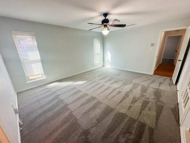 4424 Denver Dr, Plano, TX 75093 - unfurnished room featuring carpet flooring, baseboards, and a ceiling fan