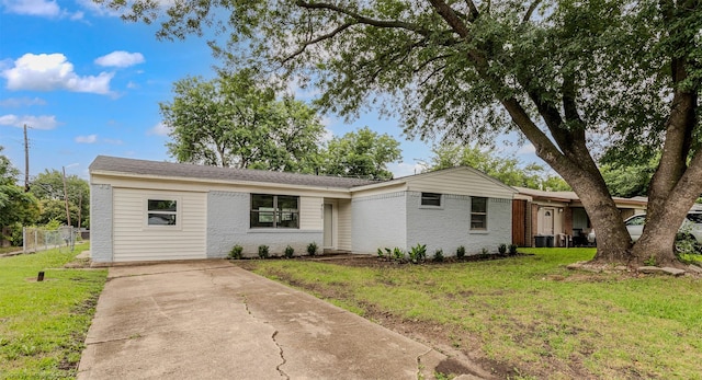 4630 Harvey Dr, Mesquite, TX 75150 - view of front of home featuring concrete driveway and brick siding