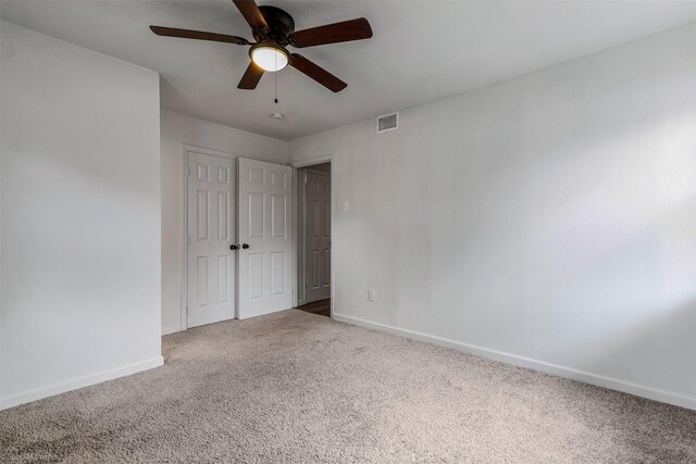 4630 Harvey Dr, Mesquite, TX 75150 - unfurnished bedroom featuring carpet flooring, baseboards, and a ceiling fan