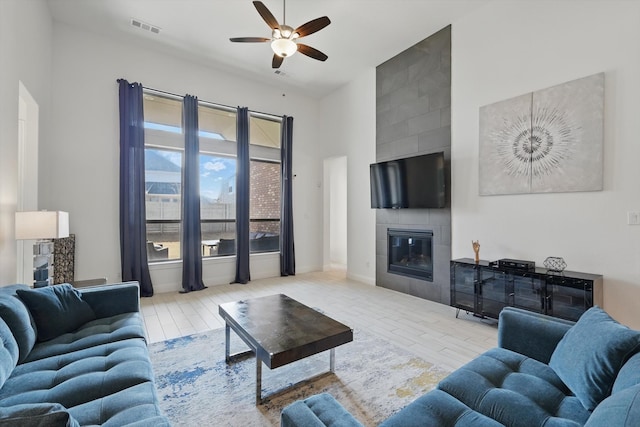 1820 Climbing Ct, Argyle, TX 76226 - living room with a fireplace and a ceiling fan