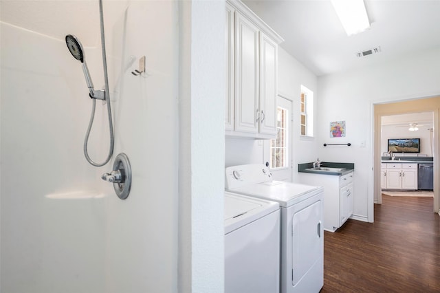 640 County Road 203, Collinsville, TX 76233 - laundry room featuring visible vents, separate washer and dryer, dark wood-style floors, cabinet space, and a sink