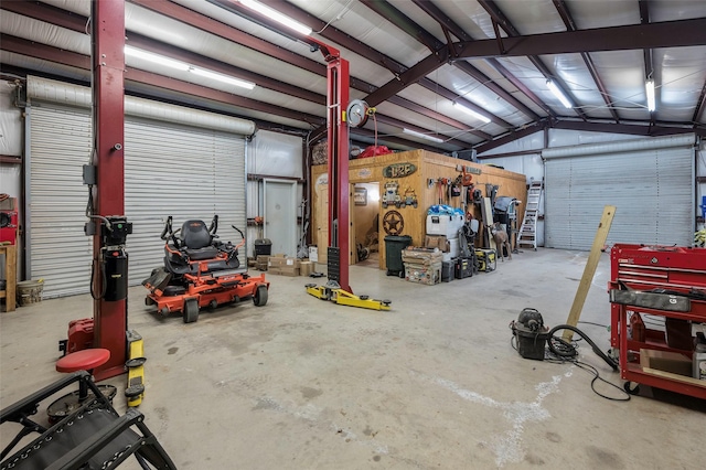 640 County Road 203, Collinsville, TX 76233 - garage with a workshop area and metal wall