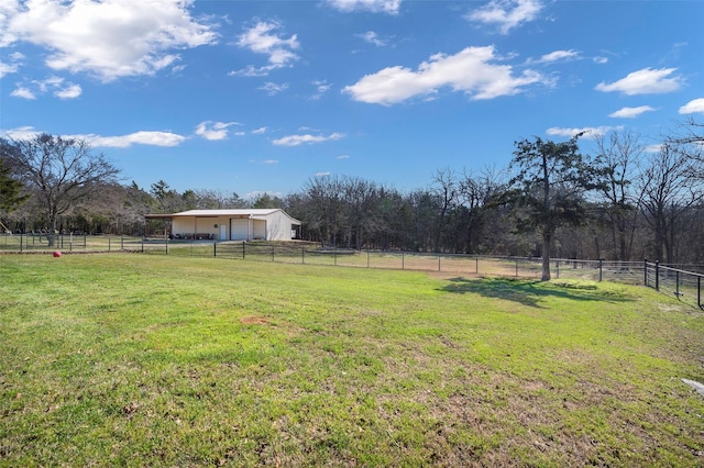 640 County Road 203, Collinsville, TX 76233 - view of yard featuring a rural view, a garage, and fence