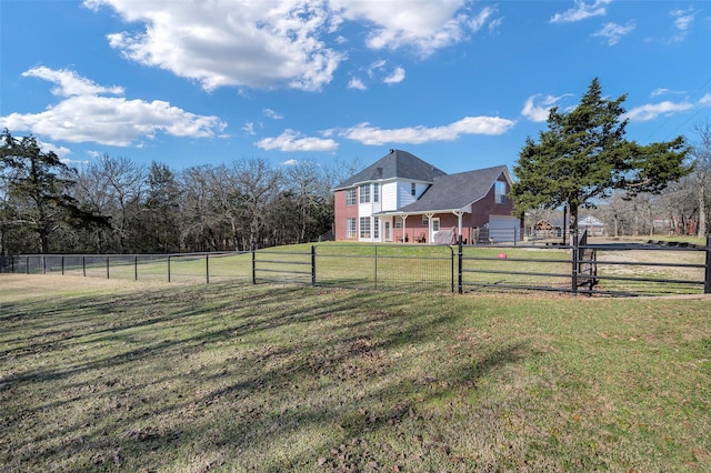 640 County Road 203, Collinsville, TX 76233 - view of yard featuring a gate, a garage, a rural view, and fence