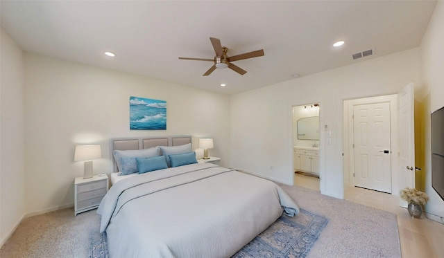 2227 Stoneman St, Dallas, TX 75215 - bedroom with ensuite bathroom, light colored carpet, recessed lighting, ceiling fan, and baseboards