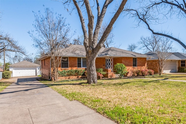 2645 Woodmere Dr, Dallas, TX 75233 - single story home with an outbuilding, a front yard, brick siding, and a detached garage