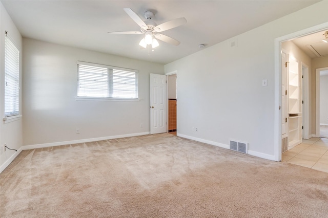 2645 Woodmere Dr, Dallas, TX 75233 - empty room with visible vents, carpet flooring, baseboards, attic access, and ceiling fan