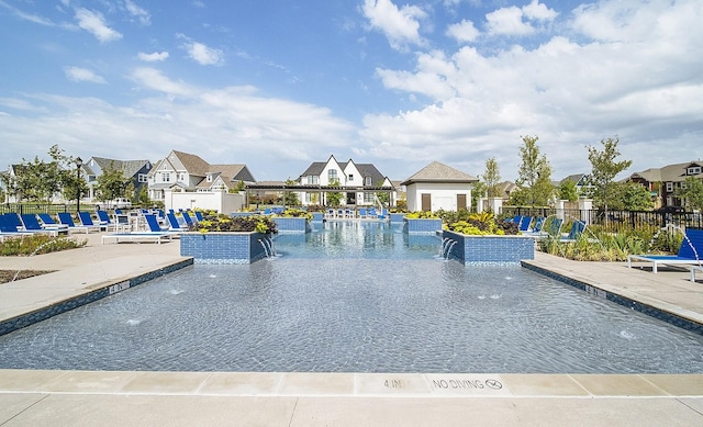 4036 Wellesley Ave, Frisco, TX 75034 - view of home's community with a residential view, fence, and a pool