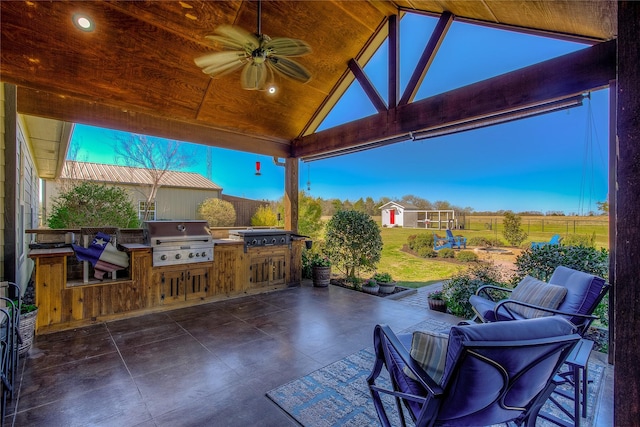 950 Rs County Road 1520, Point, TX 75472 - view of patio / terrace with exterior kitchen, a ceiling fan, and an outbuilding