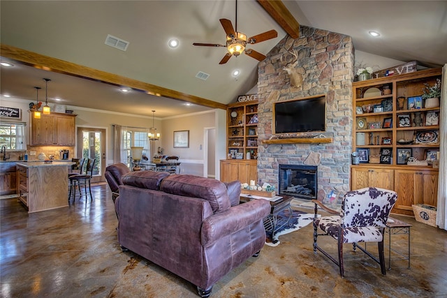 950 Rs County Road 1520, Point, TX 75472 - living room with a ceiling fan, recessed lighting, a fireplace, built in shelves, and ornamental molding