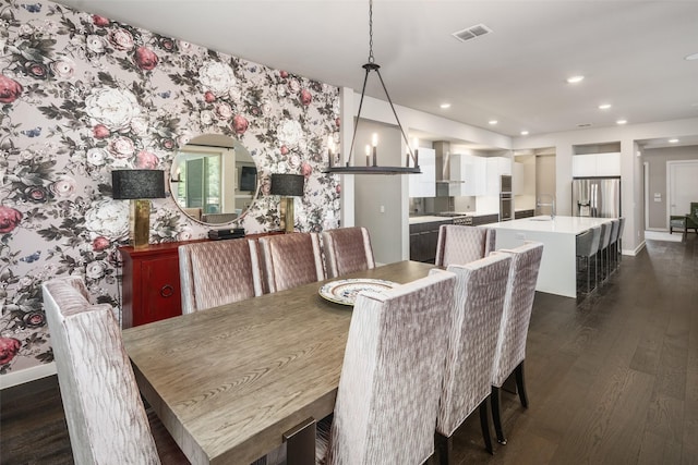 dining room with visible vents, baseboards, wallpapered walls, recessed lighting, and dark wood-type flooring