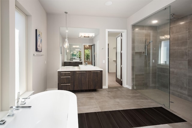4029 Campania Ct, Colleyville, TX 76034 - bathroom with a shower stall, a freestanding tub, vanity, and recessed lighting