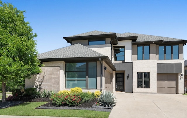 4029 Campania Ct, Colleyville, TX 76034 - view of front of house featuring concrete driveway, stucco siding, a shingled roof, and a garage