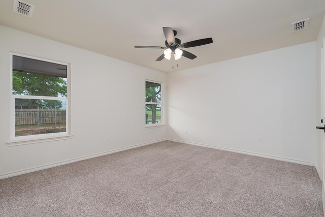 5557 N 10th, Abilene, TX 79601 - unfurnished room featuring carpet flooring, baseboards, and ceiling fan