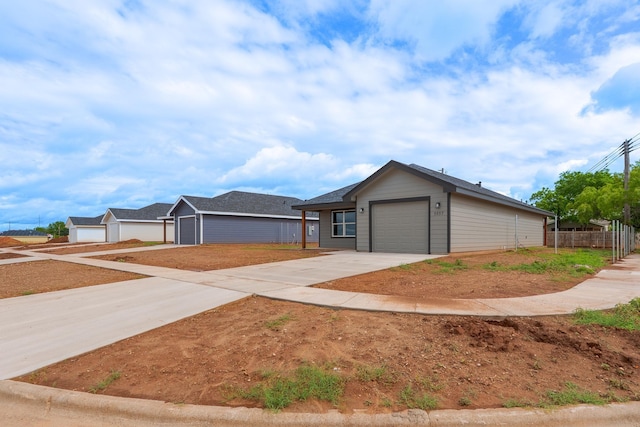 5557 N 10th, Abilene, TX 79601 - view of front of property featuring driveway and an attached garage