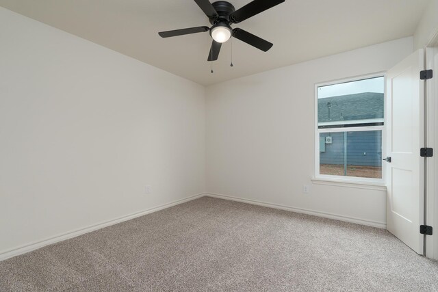 5557 N 10th, Abilene, TX 79601 - carpeted empty room featuring a ceiling fan and baseboards