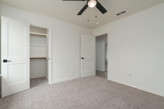 5557 N 10th, Abilene, TX 79601 - unfurnished bedroom with carpet flooring, baseboards, a closet, and a ceiling fan