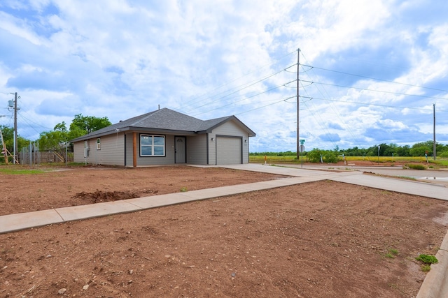 5557 N 10th, Abilene, TX 79601 - view of front of home with concrete driveway and a garage