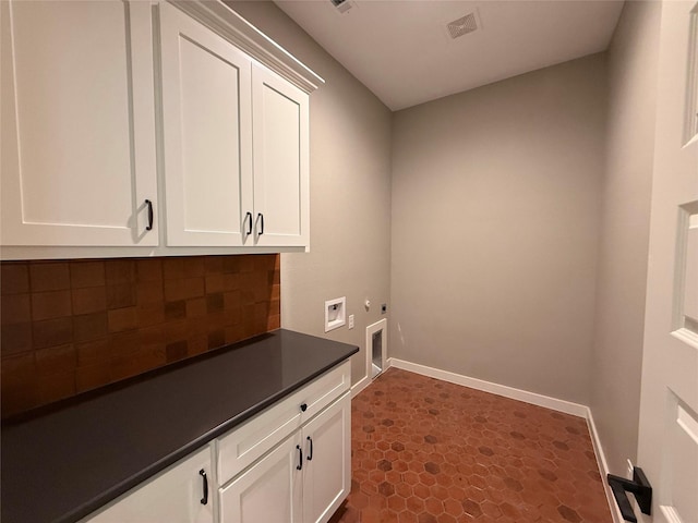 JarTBD Leo Lane, Poolville, TX 76487 - laundry area with hookup for a washing machine, visible vents, hookup for an electric dryer, baseboards, and cabinet space