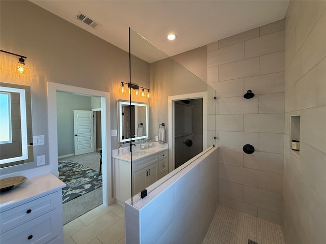 JarTBD Leo Lane, Poolville, TX 76487 - full bathroom featuring visible vents, two vanities, recessed lighting, a sink, and walk in shower