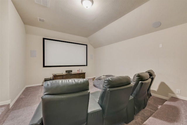 4406 Ravenbank Dr, Rockwall, TX 75087 - home theater with visible vents, lofted ceiling, baseboards, and carpet flooring