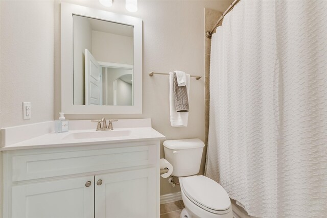 4406 Ravenbank Dr, Rockwall, TX 75087 - full bathroom featuring tile patterned floors, a shower with shower curtain, toilet, and vanity
