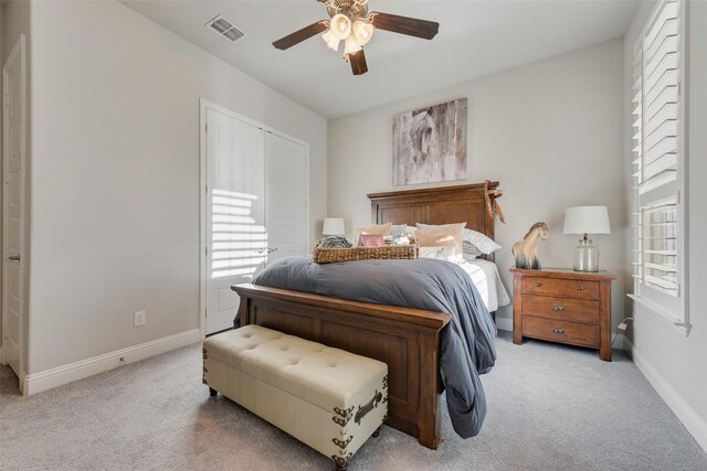 4406 Ravenbank Dr, Rockwall, TX 75087 - bedroom featuring ceiling fan, baseboards, visible vents, and light carpet