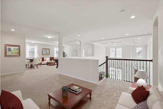 carpeted living room with recessed lighting and baseboards
